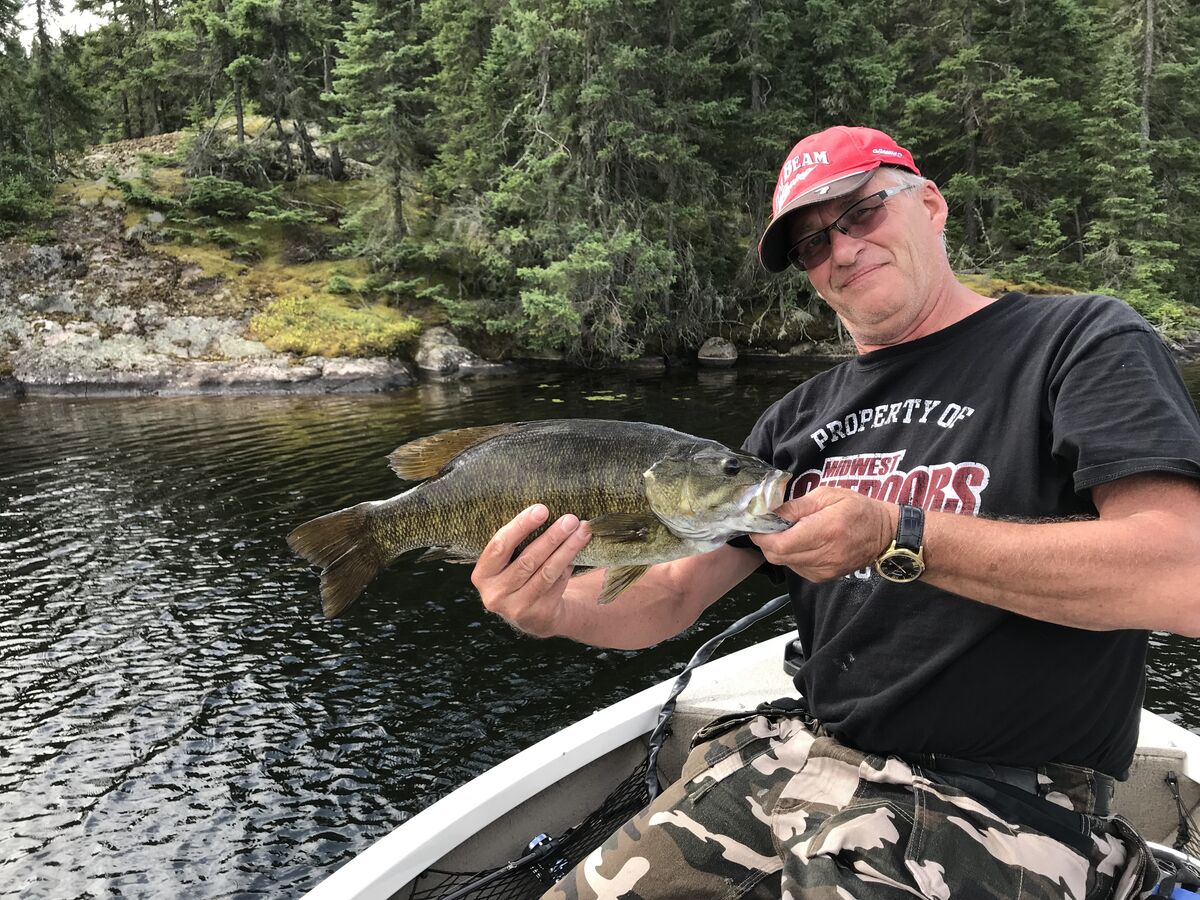 old man fishing on the lake fish' Bucket Hat