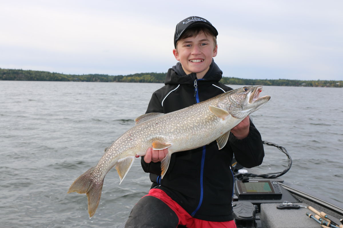 JIGGING UP FALL LAKE TROUT  Sunset Country, Ontario, Canada