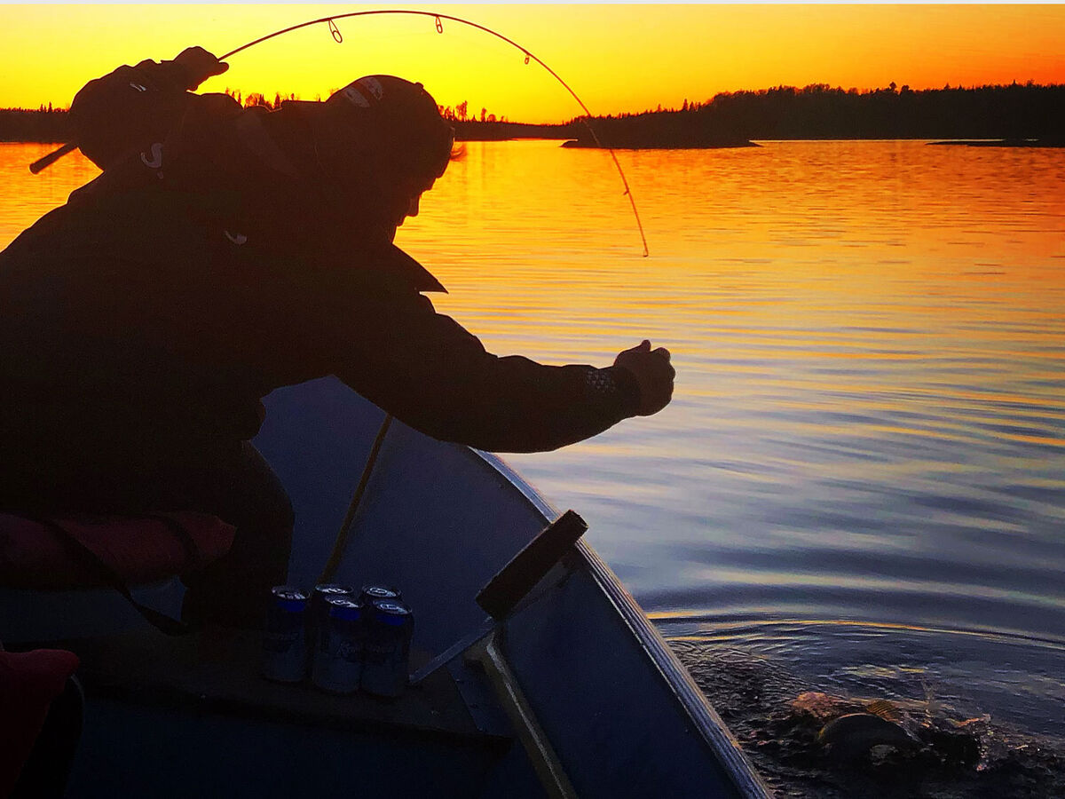 Fishing at sunset on Sydney Lake
