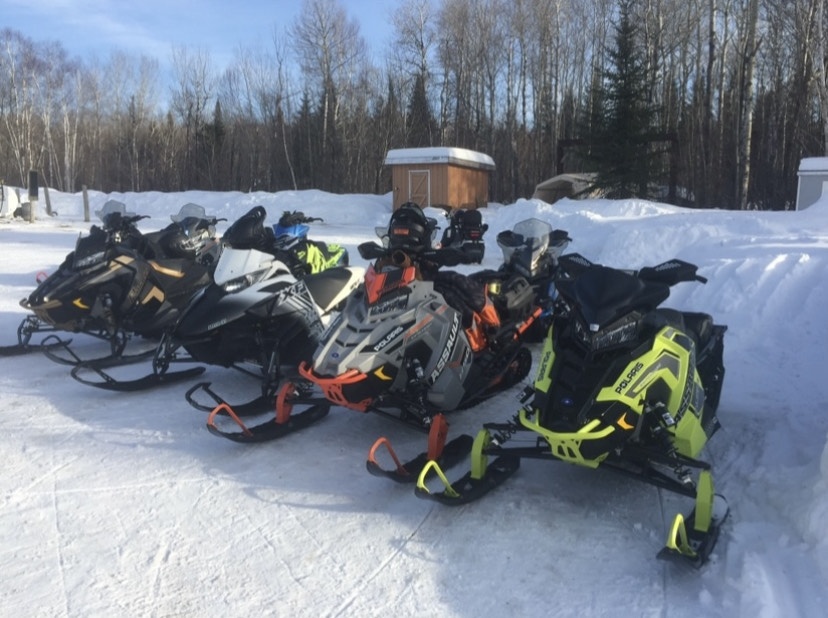 Winter vacations - snowmobiling at Perch Lake Lodge